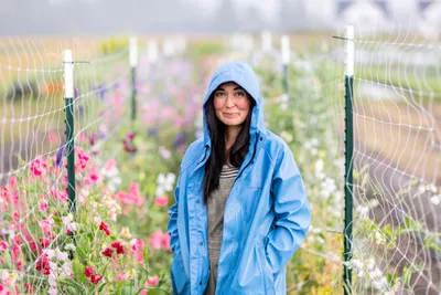 Teresa Shiraishi tends to her small organic flower and vegetable farm in Sequim, Washington on July 24, 2023. Siraishi is a Clinical Social Work/Therapist with a focus on racial identity and trauma, among other things. She also has a background in social justice organizing. For the past few years she and her husband have turned some of their focus to organic farming.